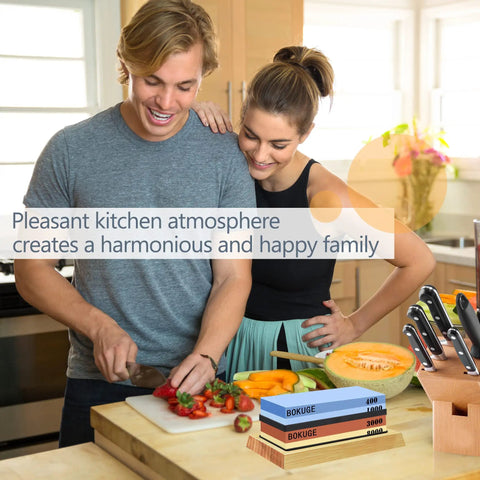 Couple using Pro Knife Sharpening Stone Kit With 4 Sided Grit 400/1000/3000/8000 in kitchen with non-slip bamboo base