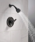 Single-Handle Shower Trim Kit With A Single-Spray Touch-Clean Shower Head In Oil-Rubbed Bronze PTT18874-OB in use