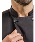 Close-up of Badass Short Sleeve Chef Jacket In Sharp Black features double breasted front and tough fabric in 2XL size.