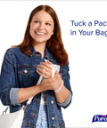 Woman holding Skin and Surface Cleaning Wipes with Fresh Scent, 20 Count Travel Pack, Pack of 12, Gentle on Skin and Surfaces.