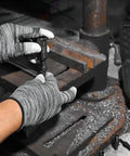 Close-up of hands using 24-Piece Slide Hammer Kit for Auto Repair and Dismantling with universal threaded adapters in workshop.