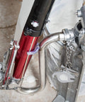 Pro Grade Compound Pump Gooseneck For Drywall Mud Loader, Heavy Duty Stainless Steel attached to a drywall bucket