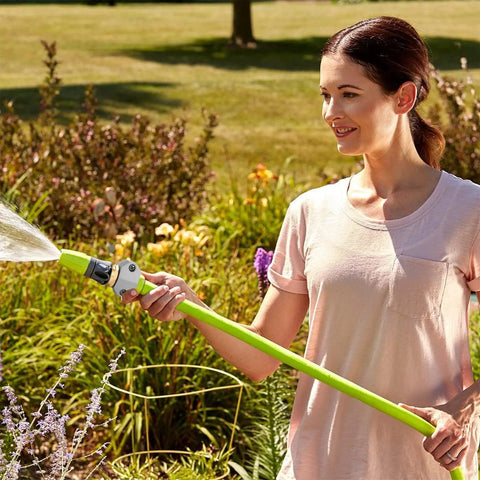 Person using garden hose with Heavy Duty Garden Hose Repair Fittings Aluminum Male Coupling Menders and Zinc Clamps