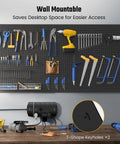 Beefed Up Heavy Duty Power Strip With 13 Widely Spaced Outlets, wall mounted with T-shape keyholes, shown under a tool rack.