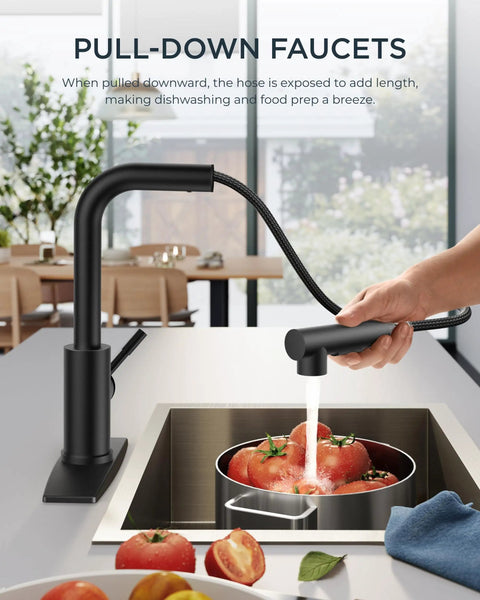 Black Kitchen Faucet With Dope Pull Down Sprayer Stainless Steel Single Handle shown over a kitchen sink with tomatoes