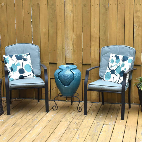 Teal Glazed Pot Water Fountain With Built In Led Light And Pump For Outdoor And Indoor Use between patio chairs