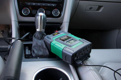 Top Rated 400 Watt Dc To Ac Power Inverter For Cars Rvs And Trailers Features Dual Ac Outlets Plus Two Usb Ports That Hella Crush Your Weekend Trips While The Smart Lcd Panel Monitors Real Time Voltage on car console