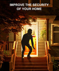 Silhouette of a person on a porch under Outdoor Motion Sensor Flood Light Bulbs for Driveways and Yards PAR38 3000K Soft White 1200 Lumen Dusk to Dawn E26 Base Zigbee Hub Required Works with SmartThings and Alexa 2 Pack illuminating the area