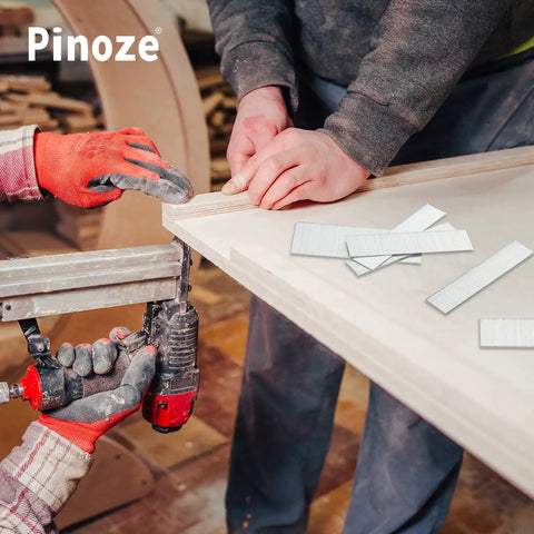 Worker using 18 Gauge Galvanized Brad Nails Assortment For Nail Gun 5000 Count In Sizes 2 In, 1-1/4 In, 1 In, 3/4 In, 5/8 In