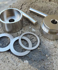 Total Game Changer Coin Ring Punch Set With Four Sleek Self Centering Tools for precise jewelry crafting, featuring steel punchers and blanks.