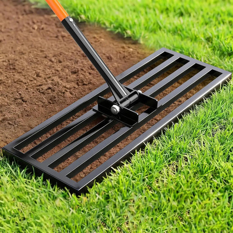 Close-up of Heavy Duty Stainless Steel Lawn Leveling Rake with 78 Inch Adjustable Handle on grass and soil.