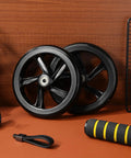 Two Pack 175mm PU Scooter Wheels Replacement Set For Mobility And Stunt Riding Non Slip Wear Resistant Weatherproof Easy Install Maintenance Free Smooth Roll For Kick Scooters And Skateboards in black, leaning against wall.