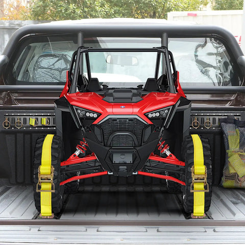 E Track Tie Down Rail Kit 31 Piece Set with a rugged UTV secured in a truck bed using yellow ratchet straps.
