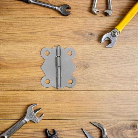 24Pcs Vintage Butterfly Hinges Set With Replacement Screws for DIY Home Decor, iron cabinet hinge displayed on wooden surface.