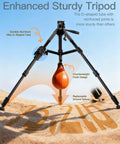 74 Inch Adjustable Rifle Tripod Stand With V Yoke Gun Rest, displaying aluminum tubes, ground spikes, and counterweight on sand