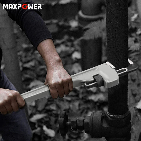Person using 36 Inch Aluminum Pipe Wrench Heavy Duty Straight Pipe Wrench for Plumbing Pros Built to Last with Lightweight Design