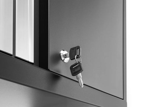 Close-up of locking mechanism with keys on Complete 7 Piece Badass Steel Garage Storage Set With Locking Rolling Tool Chest.
