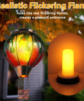 2 Pcs Glass Hot Air Balloon Solar Lanterns With Flickering Flame Hummingbird Design For Outdoor Garden Decor on tree