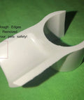 Close-up of a 3/4 inch internal diameter white PVC snap-on jump cup with smooth edges, used for dog agility training.