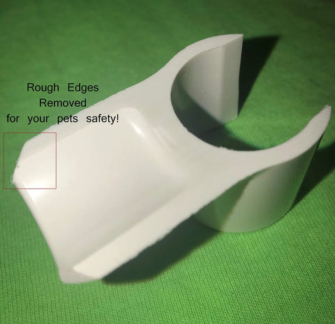 Close-up of a 3/4 inch internal diameter white PVC snap-on jump cup with smooth edges, used for dog agility training.
