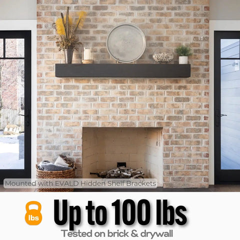 Badass Hidden Floating Shelf Brackets Featuring Slick Pinol Screw Tech For Rock Solid Zero Sag Mounts Ideal For Heavy Mantels Kitchen Shelving Decor Projects With Quick Hardware Setup Four Pack mounted with black shelf on brick wall.