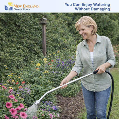 Woman using 30 Inch Soft Rain Watering Wand With Gentle Shower Spray in garden, highlighting comfort grip and lightweight design.
