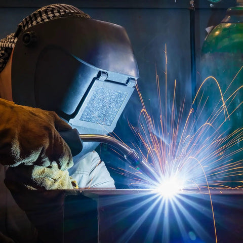 Welder using Game Changing Smooth Rolling ER70S6 Mig Welding Wire 0.045 Inch Diameter Two Pound Spool for clean arcs.