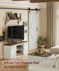 Farmhouse TV Stand Built To Handle 65 Inch TVs With Sliding Barn Doors, Rustic White And Honey Brown in living room