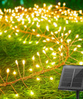 120LED 10Ft Solar Fairy Lights Outdoor Waterproof With 8 Modes IP65 Firecracker Twinkle String Lights illuminating grass at night