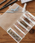 49 Piece M6 Hex Socket Cap Bolt And Barrel Nut Set - 40-80mm Fasteners with open storage box on wood surface