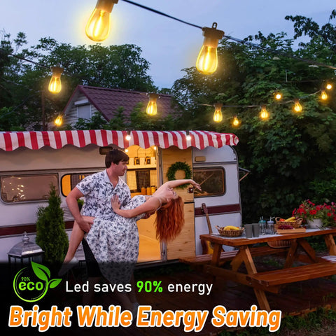 131 Ft LED Outdoor String Lights With Shatterproof S14 Bulbs Dimmable And Waterproof illuminating a patio at night with a couple dancing