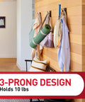 XL Matte Black Triple Hook With Three Adhesive Strips For Damage Free Wall Hanging No Tools Needed Holds Up To 10 Lbs on wooden wall
