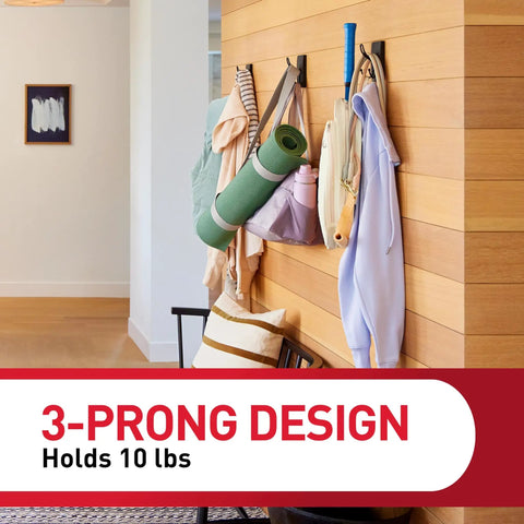 XL Matte Black Triple Hook With Three Adhesive Strips For Damage Free Wall Hanging No Tools Needed Holds Up To 10 Lbs on wooden wall
