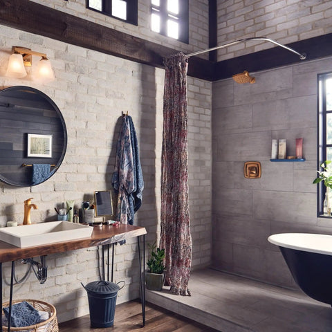 Bathroom with modern industrial design featuring a round mirror, sink, and towel bar with Super Stylish Brushed Gold 24 Inch Bathroom Towel Bar Brings That Contemporary Glam Vibe To Your Space With Sleek Modern Brushed Texture Easy Hassle Free Install Goes Great With Voss Collection For A Fresh Cozy Updated Bath Look in the background.