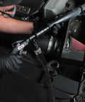 Slick Radiator Flush Kit Gun With Garden Hose Quick Connect being used on automotive engine for coolant flushing.
