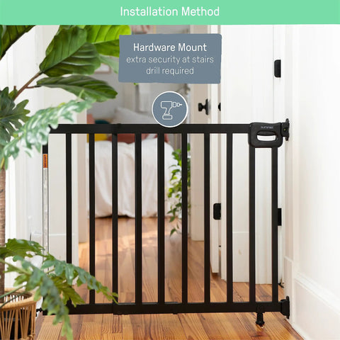 Deluxe Stair Gate For Pets And Kids, Super Easy Install No Fuss Secure Build, showing closed black wood gate across hallway