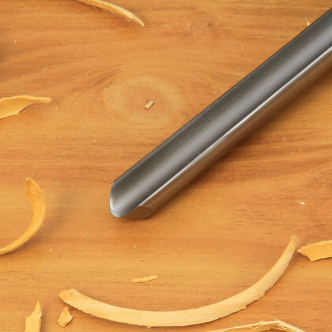 Kickass Three Piece HSS Bowl Gouge Set Featuring Solid Beech Handles For Flawless Bowl And Vessel Turnings Heavy Duty Woodturning Lathe Tools For The Modern Craftsman close-up of HSS bowl gouge on wood shavings.