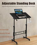 Total Game Changer Small Height Adjustable Standing Desk With Tiltable Tabletop And Smooth Rolling Wheels, ergonomic design with a laptop.