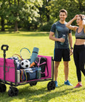 All In One Portable Collapsible Wagon Cart With Removable Side Lightweight Foldable Utility Groceries Wagon For Dogs Cats Camping Beach Shopping Sports Gardening Fishing Pink loaded with sports gear in a park.