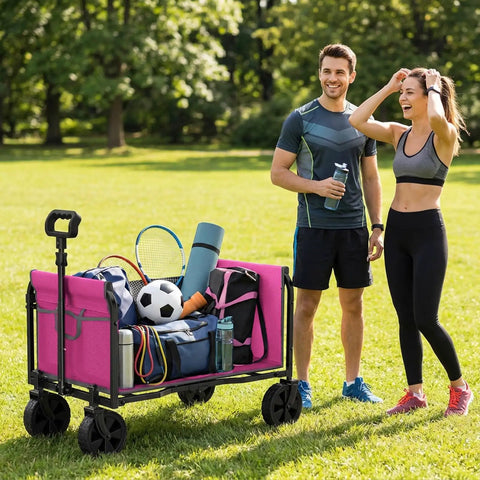 All In One Portable Collapsible Wagon Cart With Removable Side Lightweight Foldable Utility Groceries Wagon For Dogs Cats Camping Beach Shopping Sports Gardening Fishing Pink loaded with sports gear in a park.