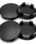 Four Pack Snap On Wheel Center Caps With 60mm Outer And 56mm Inner Diameter showing black ABS covers designed for universal fit.
