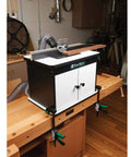 Heavy Hitter Benchtop Router Table Decked Out With A Beefy 24 Inch Laminate Top, Precision Tuned Aluminum Fence, Snap Switch Insert Plate in workshop.