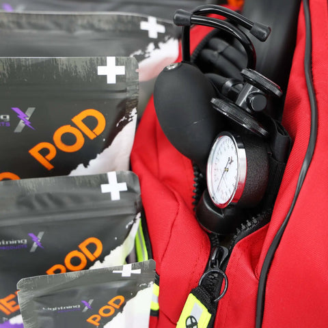 Close-up of Large EMT Trauma Kit For First Responders, Fully Stocked Trauma Bag With Over 240 Supplies For CPR, Red Bag