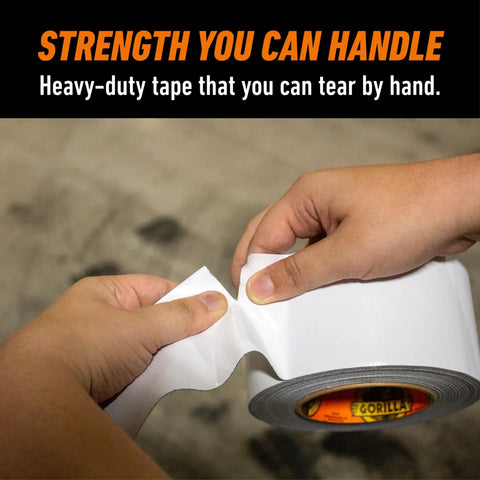 Person tearing Heavy Duty And Weather Resistant White Wide Duct Tape For Indoor And Outdoor Use, Nearly 3 Inch Wide Reinforced Backing