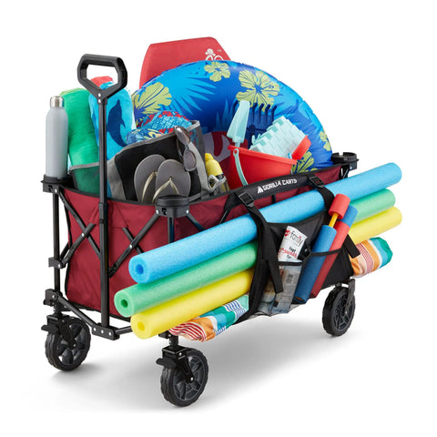 Heavy Duty Collapsible Outdoor Utility Wagon With Oversized 36 By 21 By 15 Bed And 150 Pound Capacity Red Foldable Rolling Cart With Cup Holders And Pockets For Beach Camping Sports Or Picnics filled with beach gear