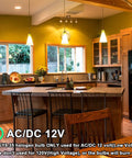 Modern kitchen with pendant lights using GY6.35 50W Dimmable Halogen Bulbs 12V Warm White 2700K lighting above a wooden island.