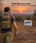Man walking towards Passive Thermal Target Kit for Zeroing and Training with heat responsive film, sunset backdrop