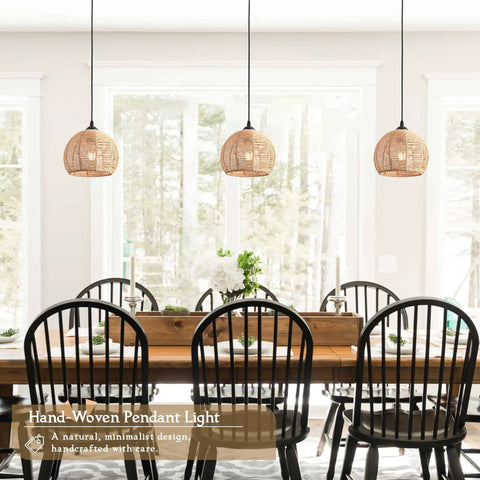 Top Tier Hand Woven Wicker Pendant Lights Trio Boasts A Natural Rattan Dome Shell with adjustable wires in a dining space.
