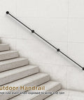 Badass Strength 10 Foot Stair Handrail And Heavy Duty Wall Mount Metal Pipe Railing for Indoor Outdoor Use Carrying Up To 450 Pounds at a sloped staircase.