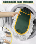 Heavy Hitting Commercial Cotton Dust Mop With Massive 39 Inch Sweeping Pad being placed in a washing machine for cleaning.